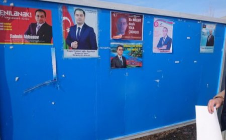 Namizədin plakatları cırılır, mağazalardan yığışdırılır -FOTO